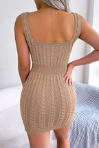 Beige knitted dress worn by a person, back view, on a white background