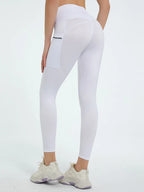 White leggings worn by a person on a white background