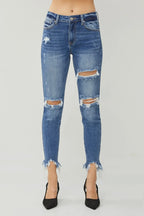Ripped blue jeans on a white background