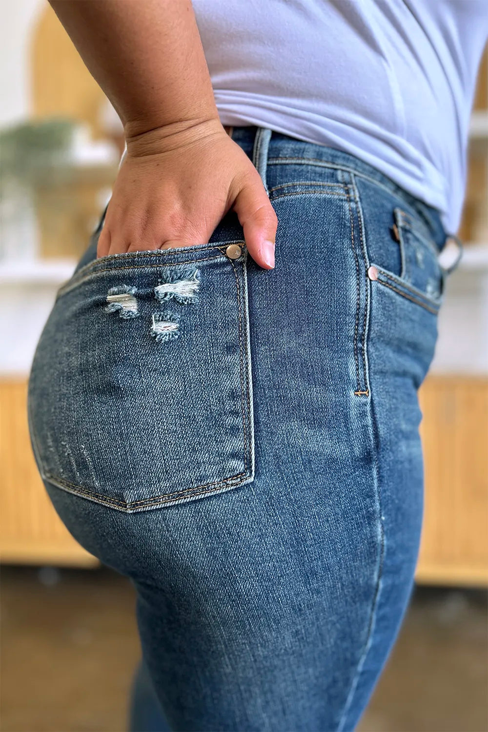 Close-up of blue jeans with a blurred background