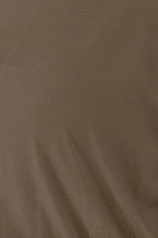 Close-up of brown fabric texture