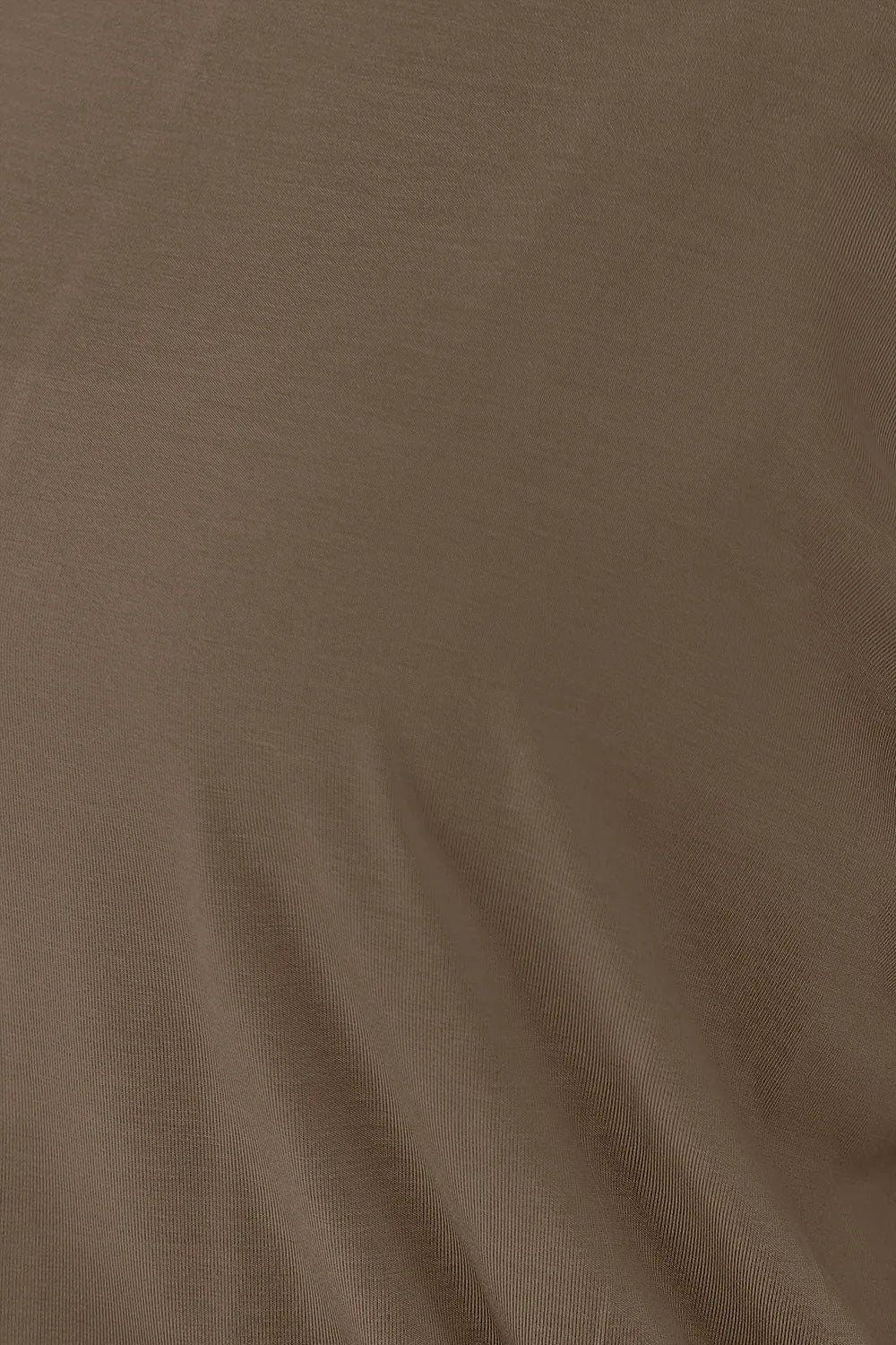 Close-up of brown fabric texture