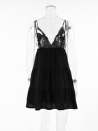 Black lace nightgown on a mannequin against a white background