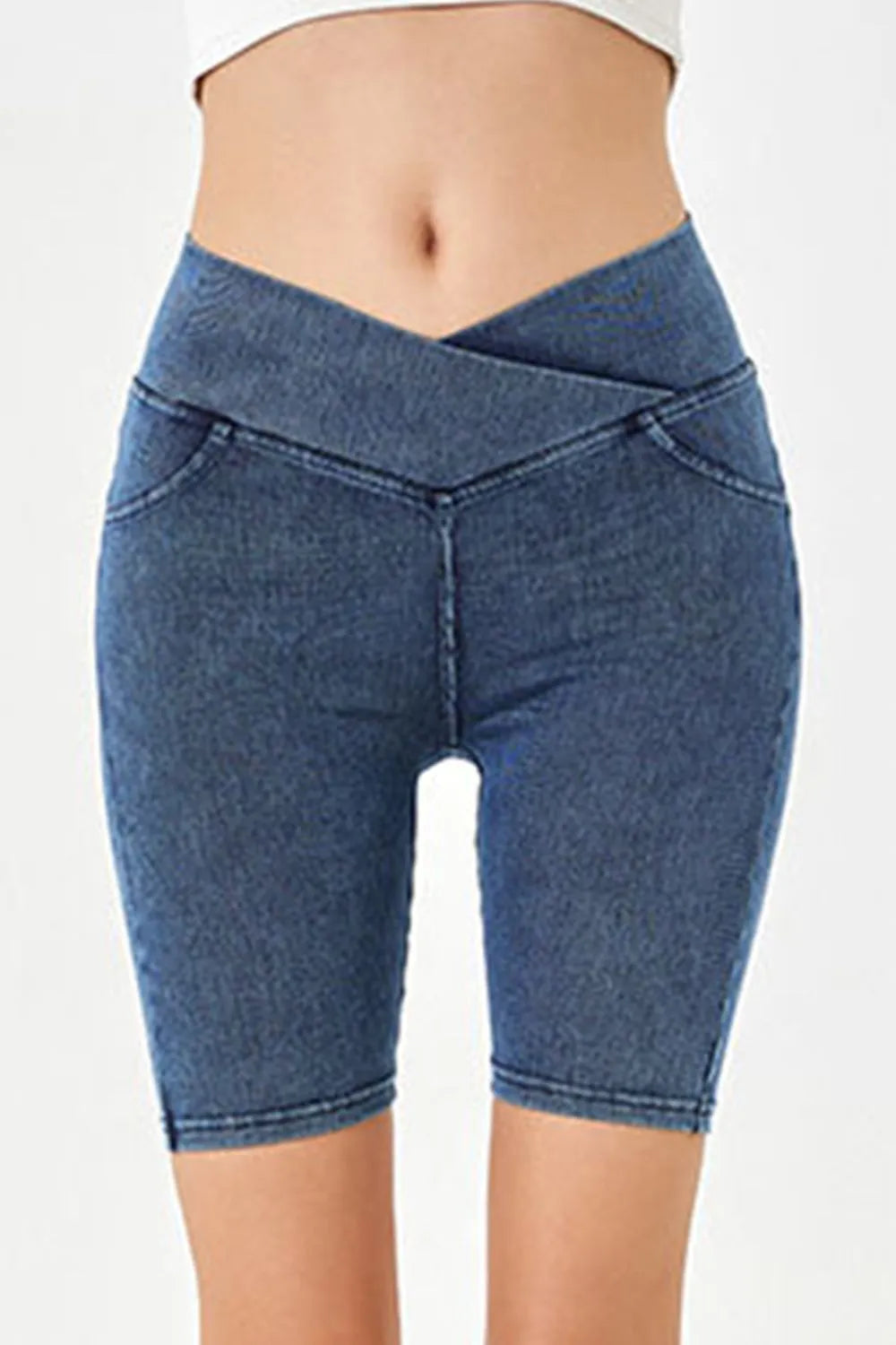 Blue denim shorts on a white background