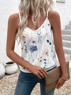 Woman wearing a floral tank top with a white background