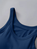 Close-up of a blue tank top on a light gray background