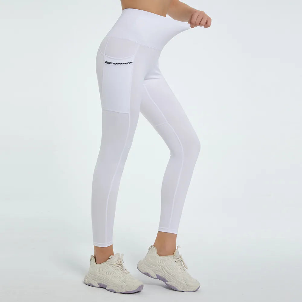White leggings worn by a person on a light gray background