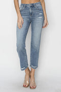 Person wearing light blue jeans on a white background