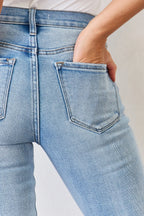 Light blue jeans with a neutral background