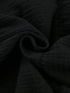 Close-up of dark textured fabric