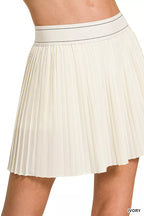 White pleated skirt on a white background