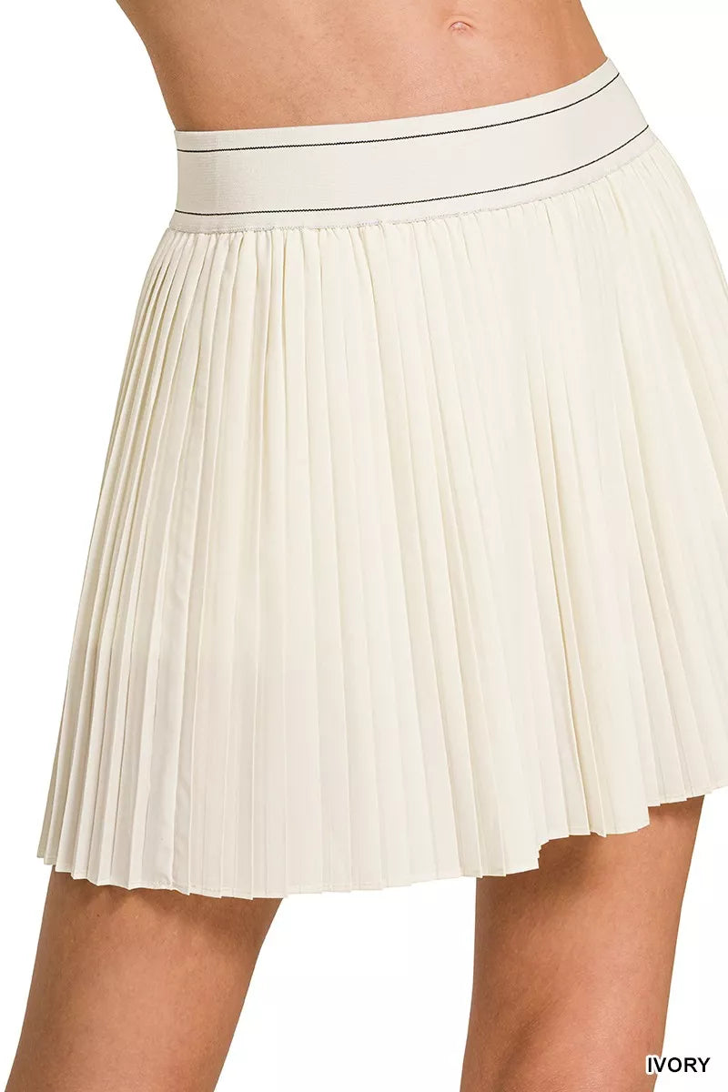 White pleated skirt on a white background