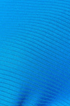 Close-up of a blue textured fabric surface